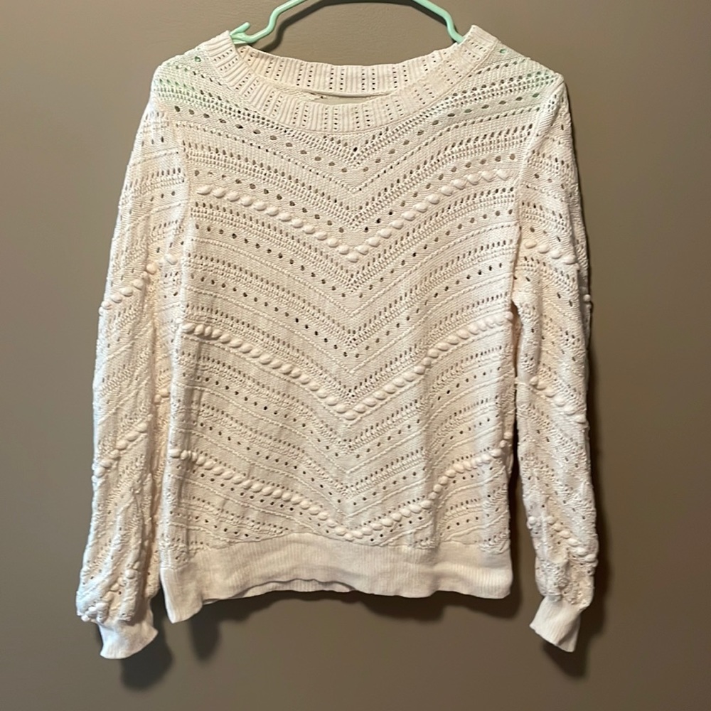 Cream colored rounded neck loft sweater
